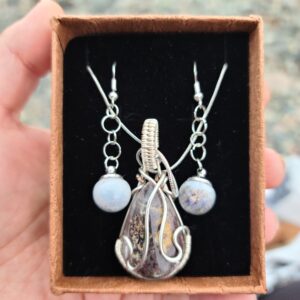 Silver-Plated Wire Wrapped Purple Rutilated Quartz Pendant