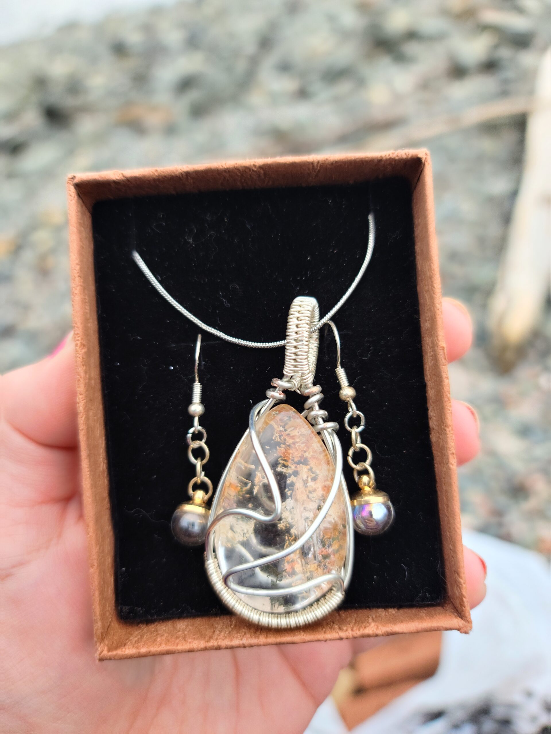Silver-Coated Wire Wrapped Champagne Rutilated Quartz Pendant