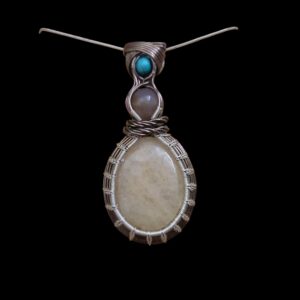Ivory-Colored Worry Stone Pendant - Starburst Pattern