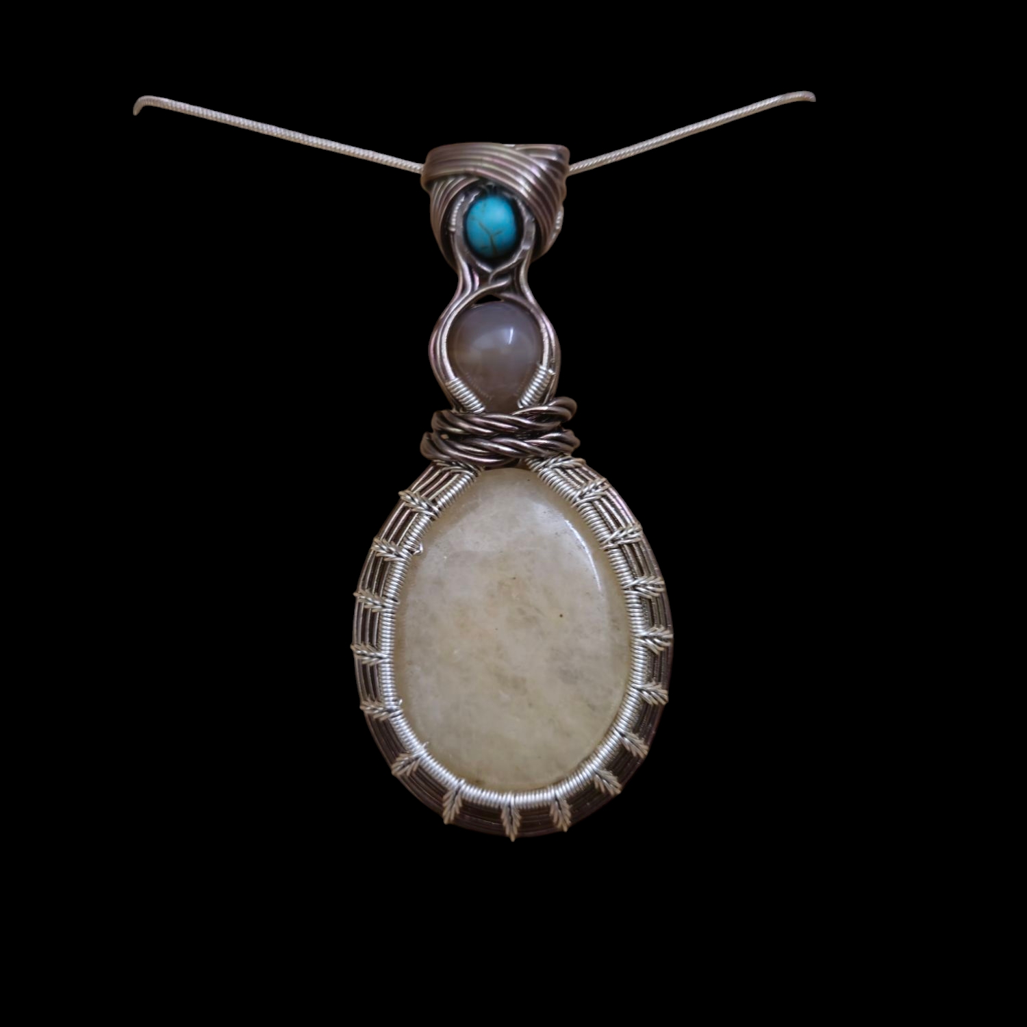 Ivory-Colored Worry Stone Pendant - Starburst Pattern